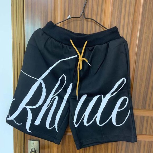 RHUDE white logo print knitted drawstring black shorts and...